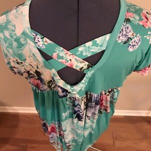 Floral cross back scoop neck tee.